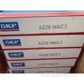 Rodamiento de rodillos cónicos SKF 30211 para caja de engranajes